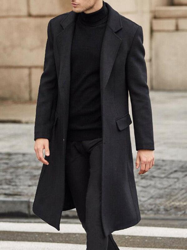 Kakaclo long woolen winter windbreaker coat in black, stylishly worn over a turtleneck outfit