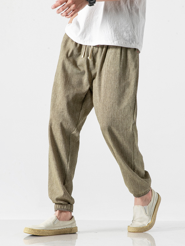 Kakaclo men's linen drawstring pants in a light brown shade, perfect for casual summer outfits