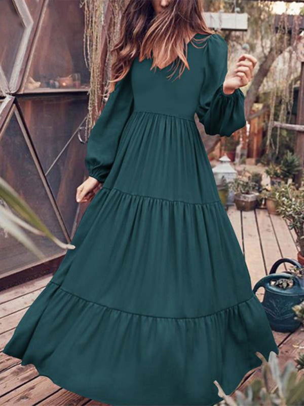 Kakaclo vintage swing dress in deep green with long sleeves and tiered design for a stylish look