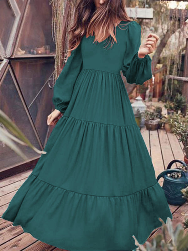 Kakaclo vintage swing dress in green with tiered design and long sleeves, perfect for casual outings