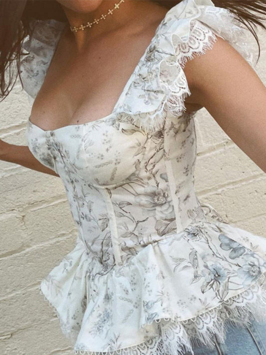Kakaclo French style lace camisole with floral print and flared peplum hem for a chic look