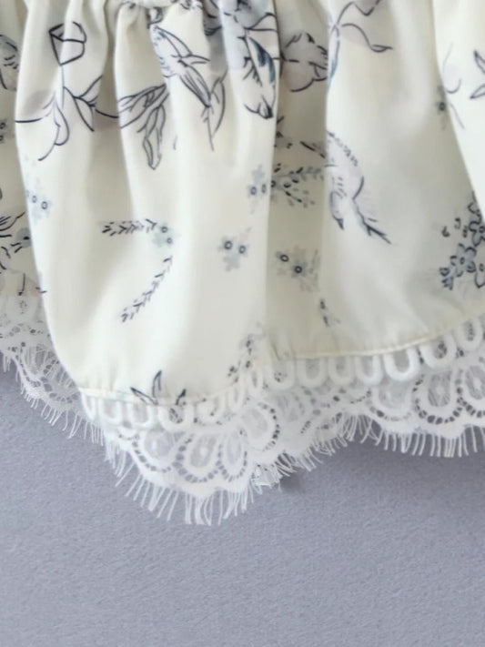 Delicate French style lace camisole with floral print and lace trim detail