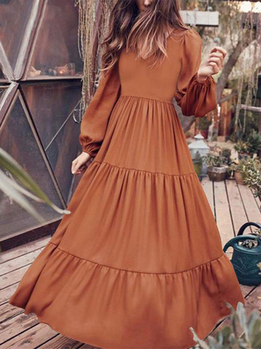 Kakaclo Vintage Swing Dress in Warm Brown with Puff Sleeves and Tiered Design