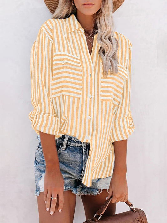 Kakaclo women's vintage stripe shirt in yellow and white with rolled sleeves, styled with denim shorts